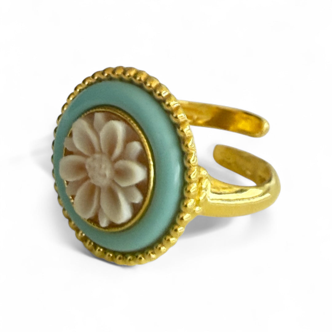 Cameo flower ring mounted in silver and turquoise paste