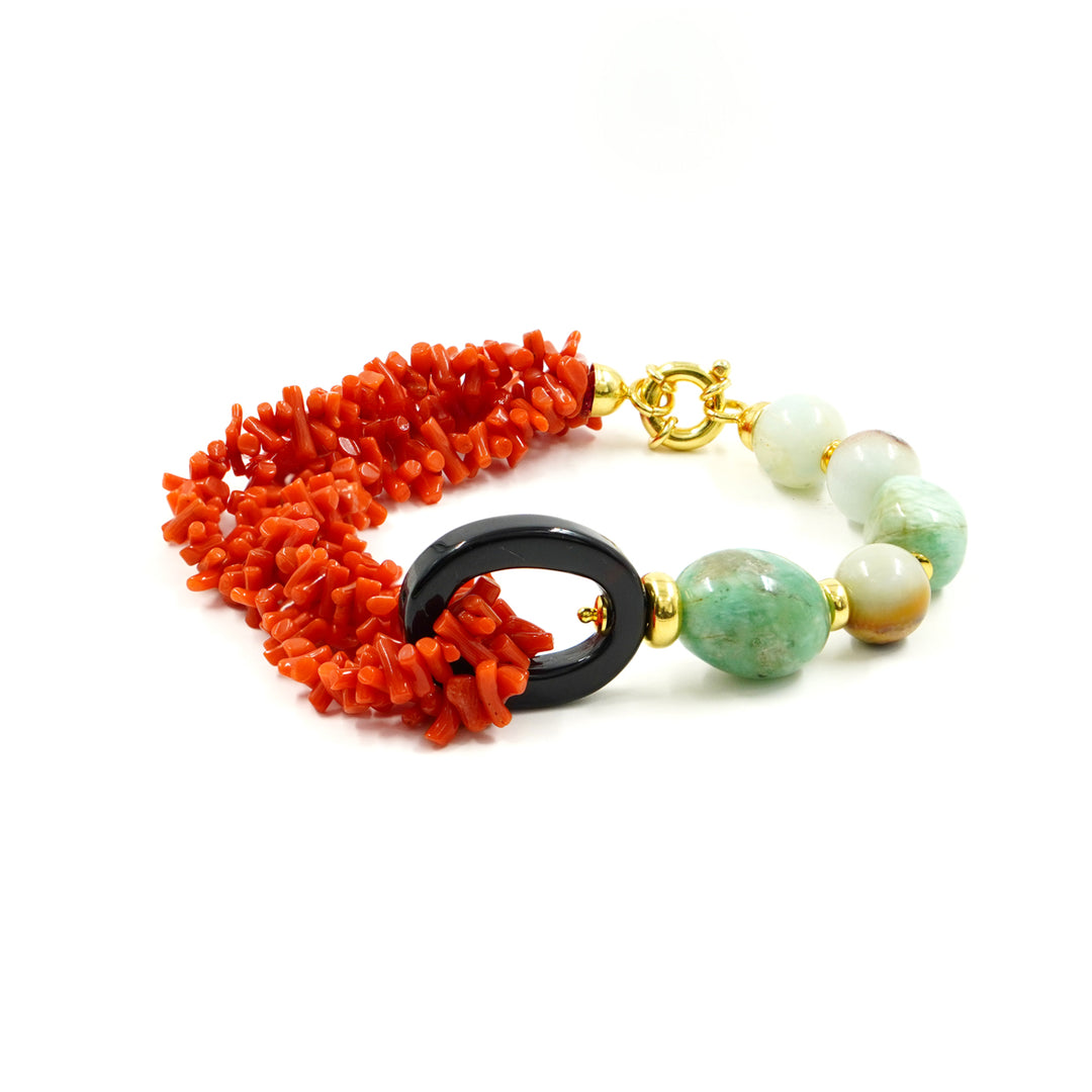 Multi-strand bracelet in orange coral mounted on silver