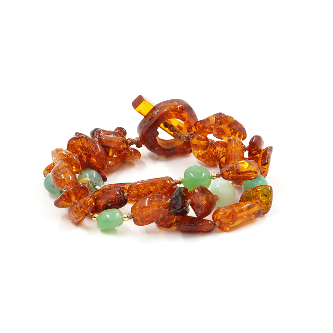 Multi-strand bracelet in amber and chrysoprase