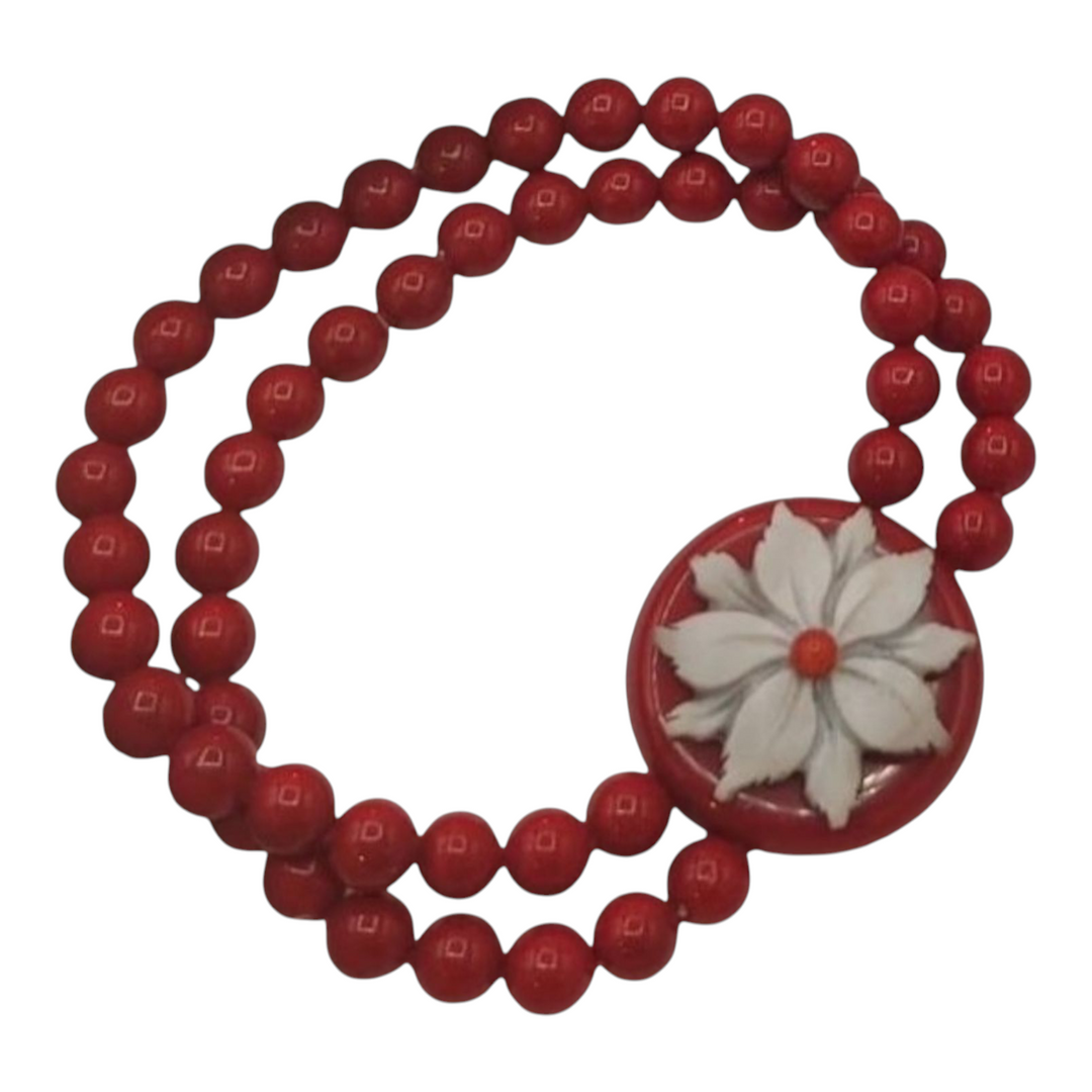 Cameo flower bracelet mounted on coral paste
