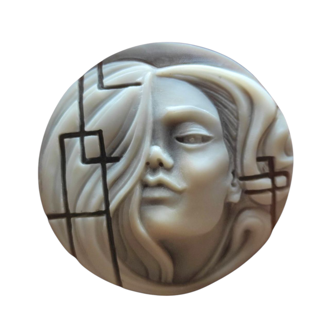 "Mystery" pendant engraved on sardonyx shell