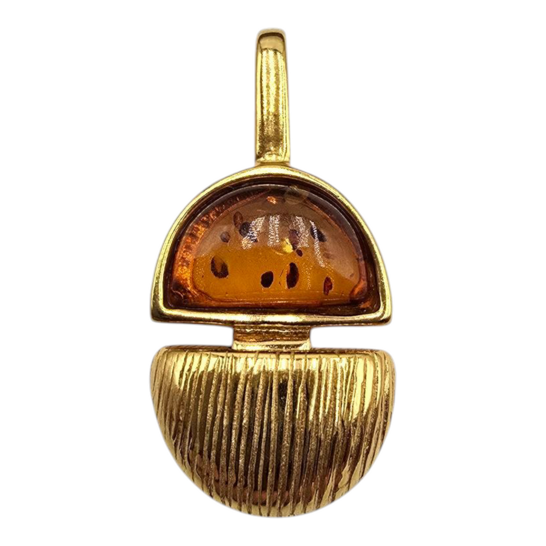 Amber patch pendant mounted in silver