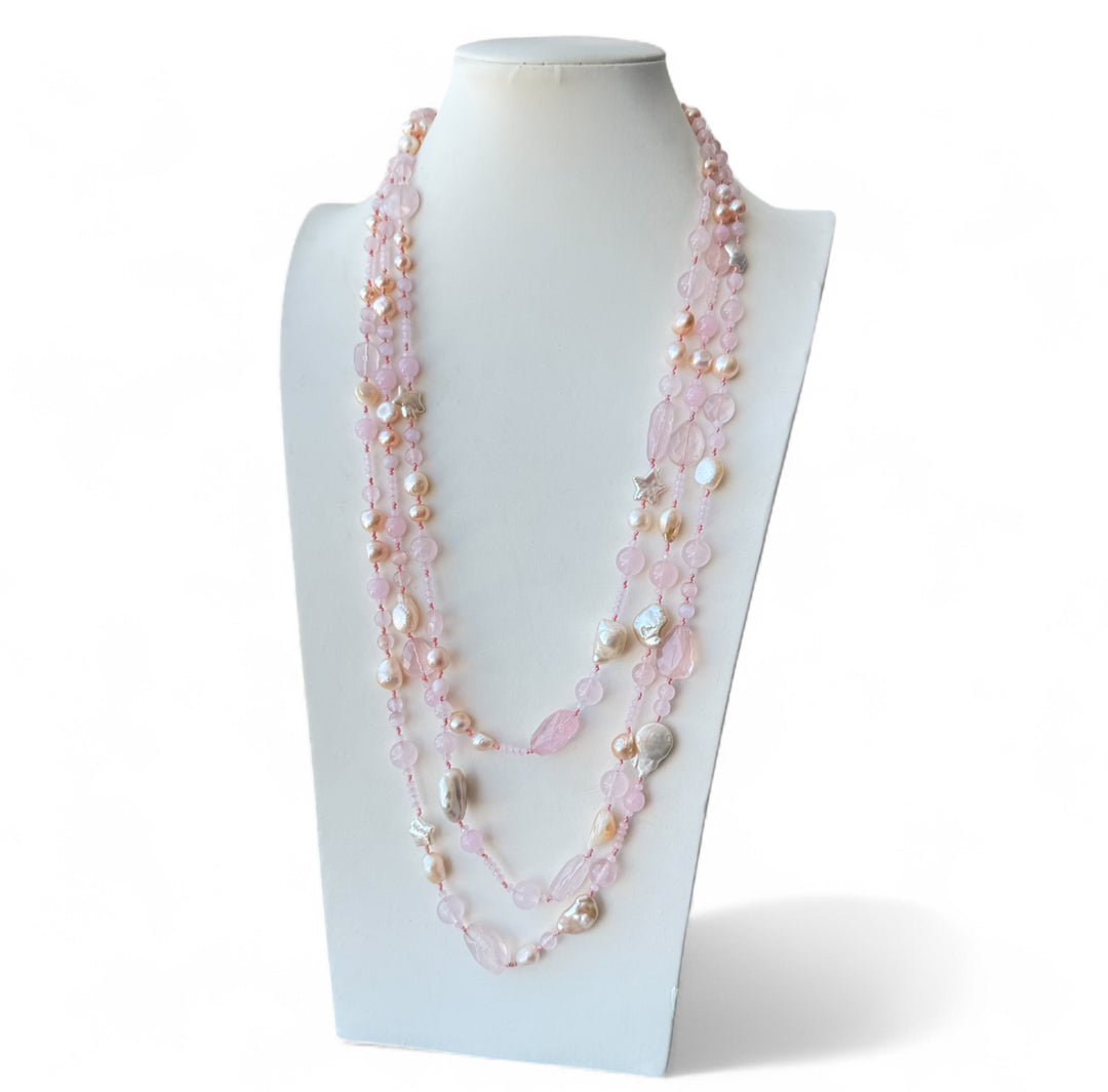 Multi-strand necklace of pink rock crystals and river pearls