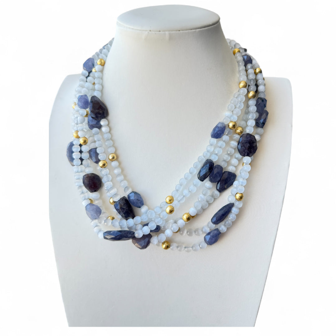 Multi-strand necklace with smoky quartz and semi-precious stones mounted on silver