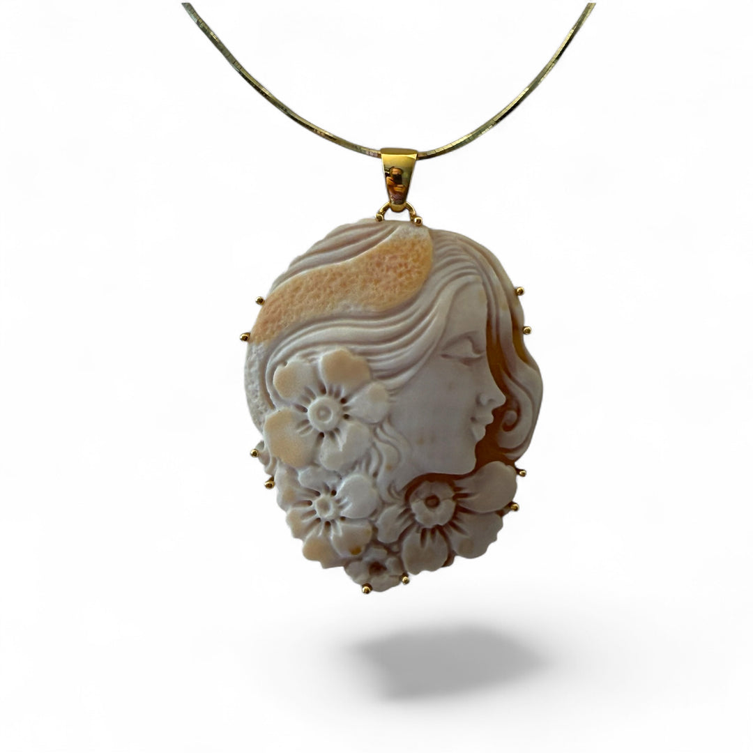 “Author's Cameo” pendant necklace made of sardonic cameo mounted in silver