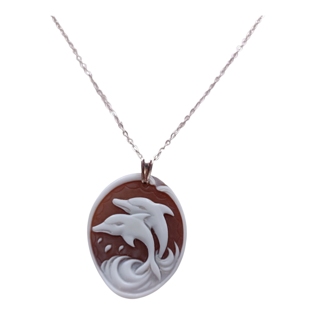 Dolphin pendant necklace in cameo mounted on silver