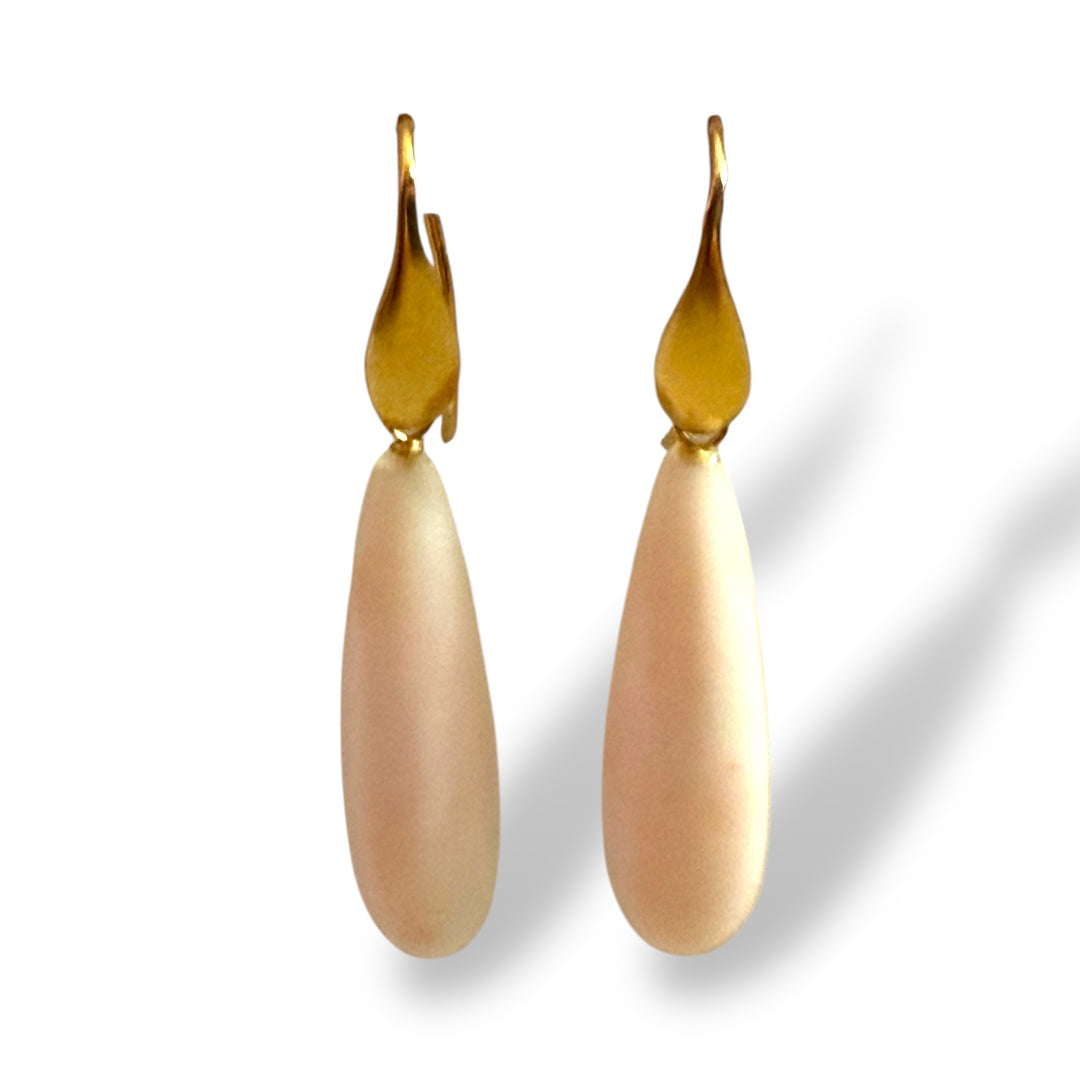 Pinkish white coral earrings mounted on silver