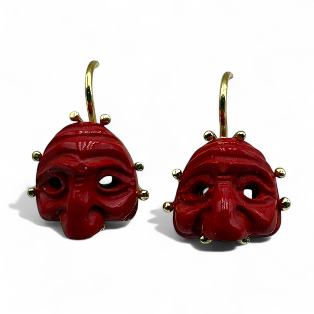 Neapolitan mask earrings in coral paste set in silver