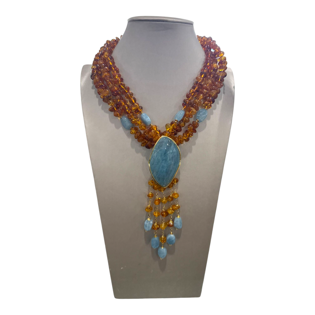 Collana acquamarina e ambra rossa montata su argento