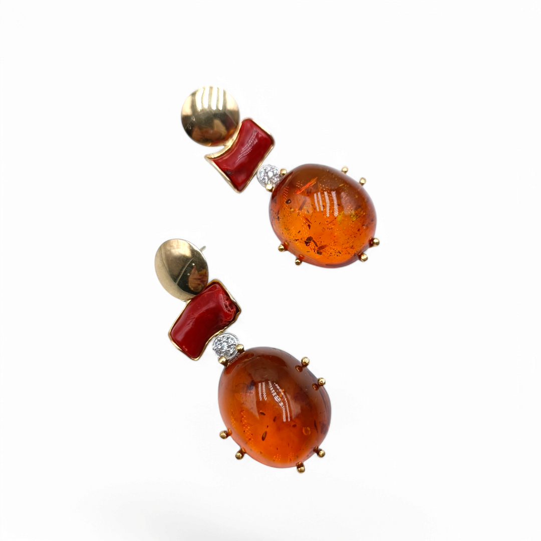 Amber and coral earrings mounted in silver