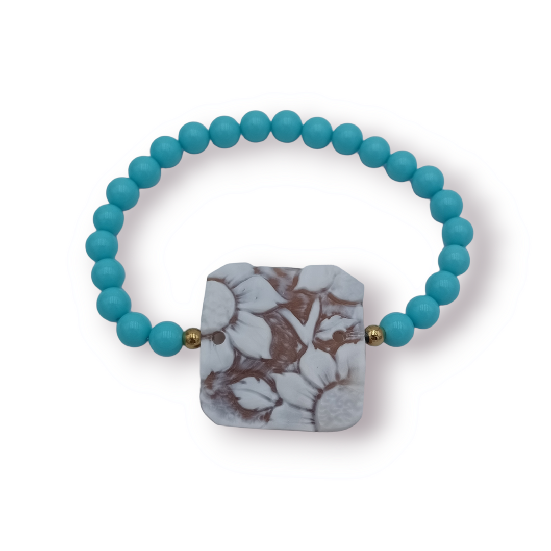 Bracciale girasole in cammeo montato su pasta turchese