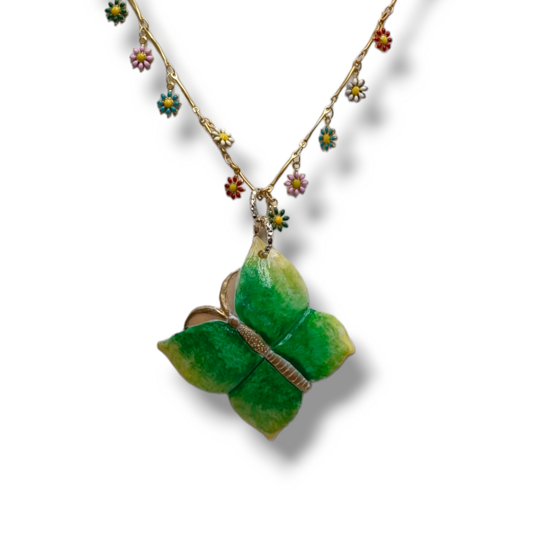 Green butterfly pendant in cameo mounted on silver