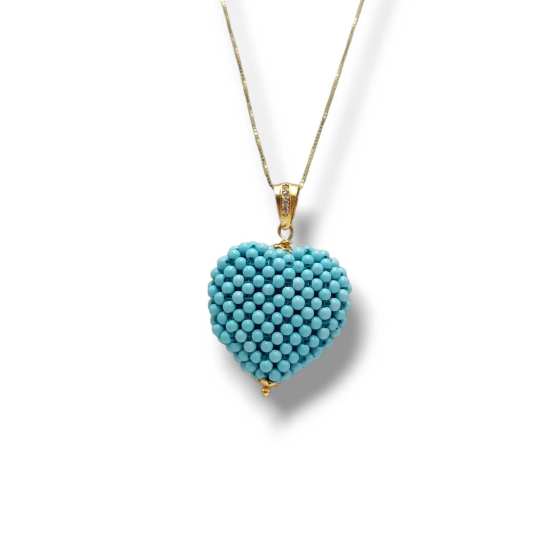 END OF COLLECTION Turquoise heart pendant mounted on silver