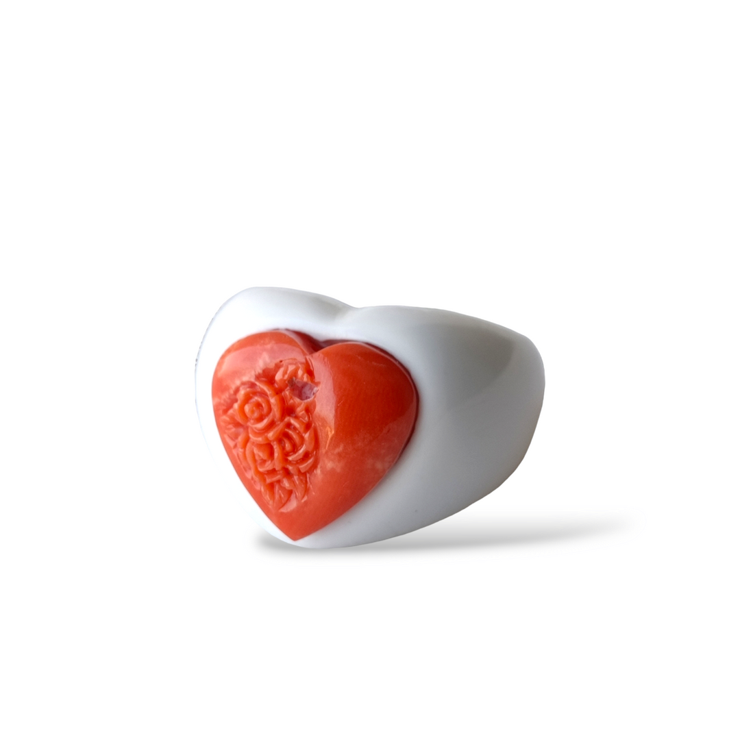 Real coral heart ring mounted on white agate