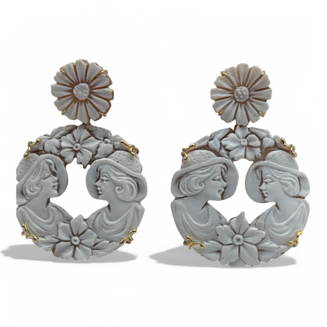 Sardonic shell “lady with hat” earrings mounted in silver