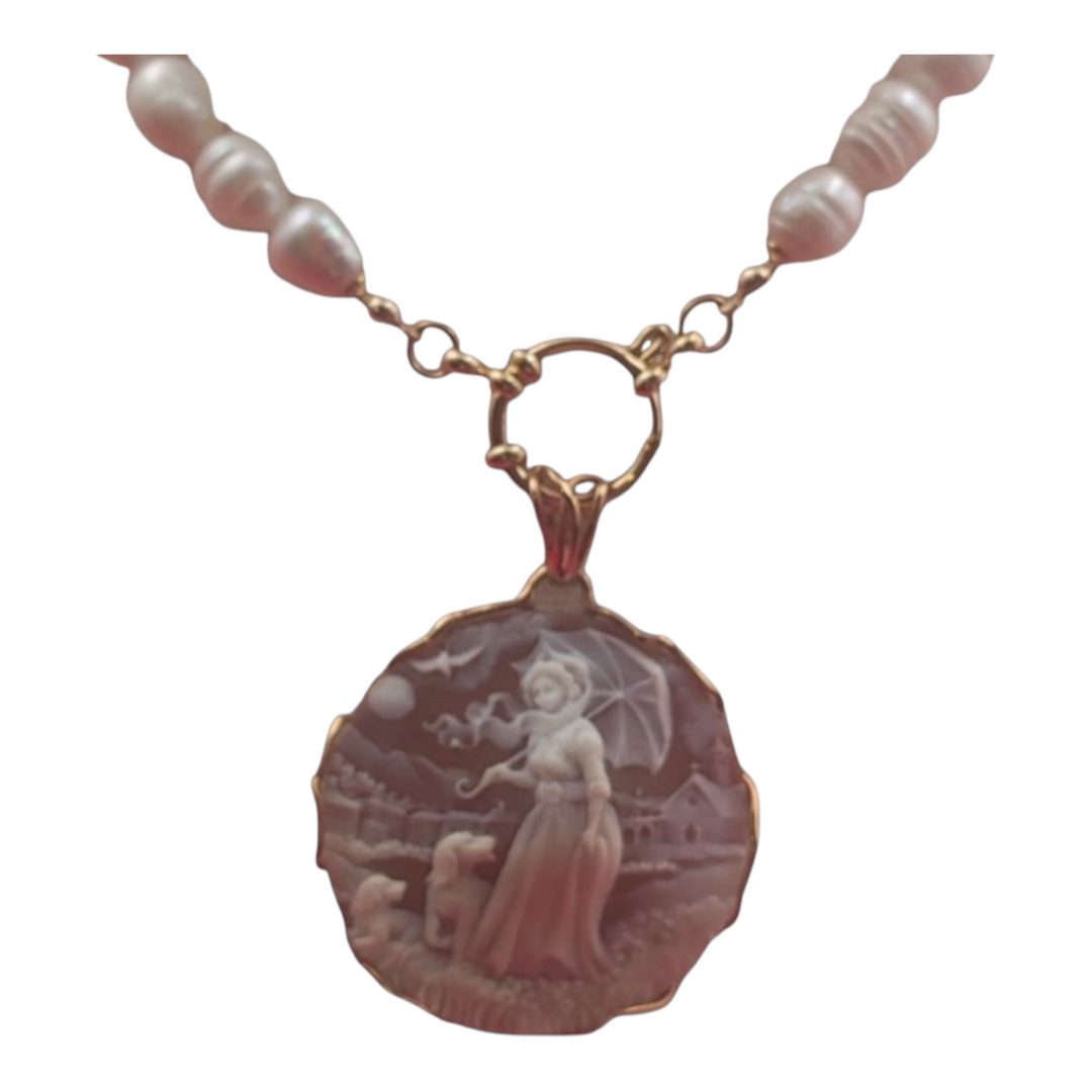Openwork letter on cameo