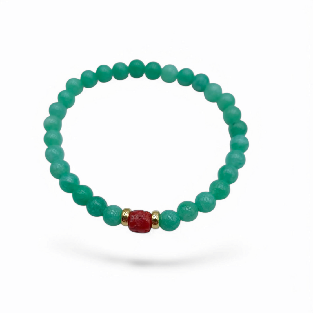 Green jade and coral bracelet mounted on silver