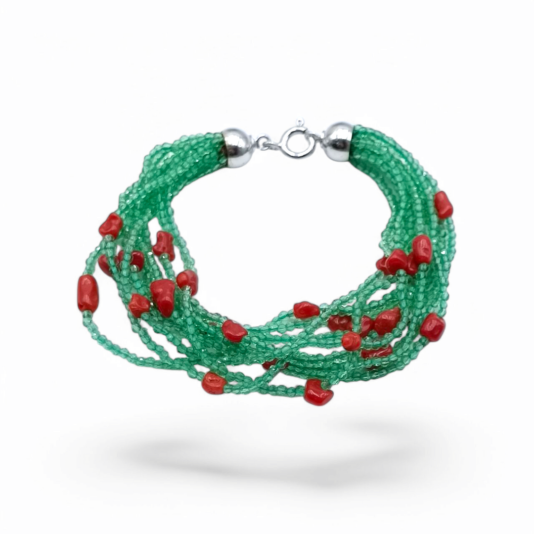 Multi-strand jade and coral bracelet mounted on silver