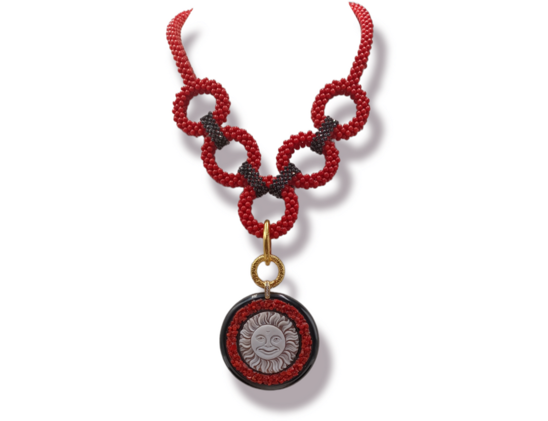 Collana sole di cammeo e corallo montato su argento