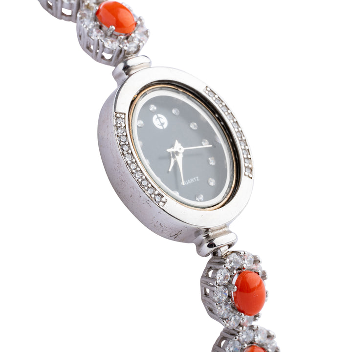 Bracelet watch with coral and zirconia mounted on silver