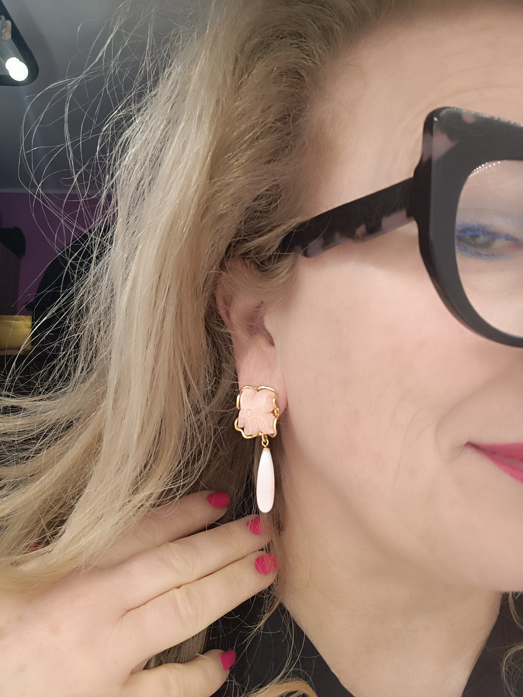 Pink coral starfish earrings mounted on silver