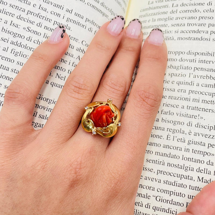Pink ring in red coral mounted on silver