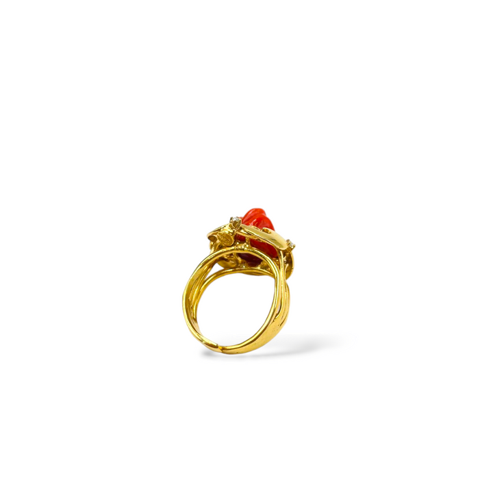 Pink ring in red coral mounted on silver
