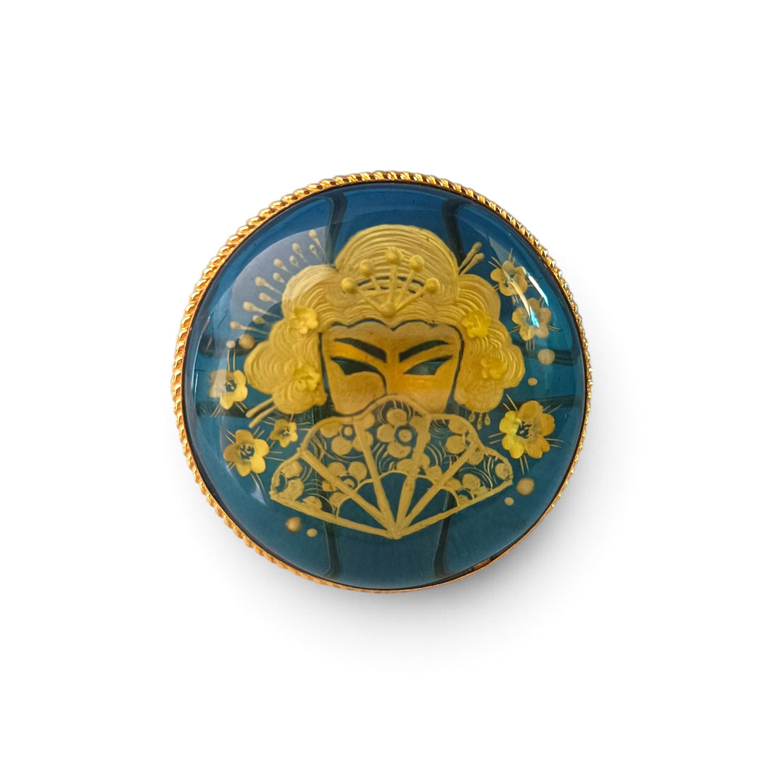Anello Geisha di Ambra blu montato in Argento Dorato
