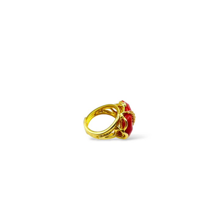 Coral stone and zirconia ring mounted on silver