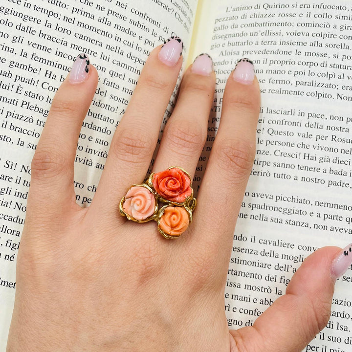 Coral rose tris ring mounted on silver