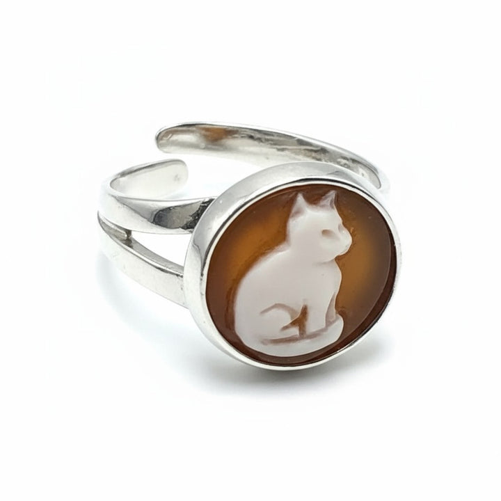 Rings with Neapolitan cameo charms mounted on silver