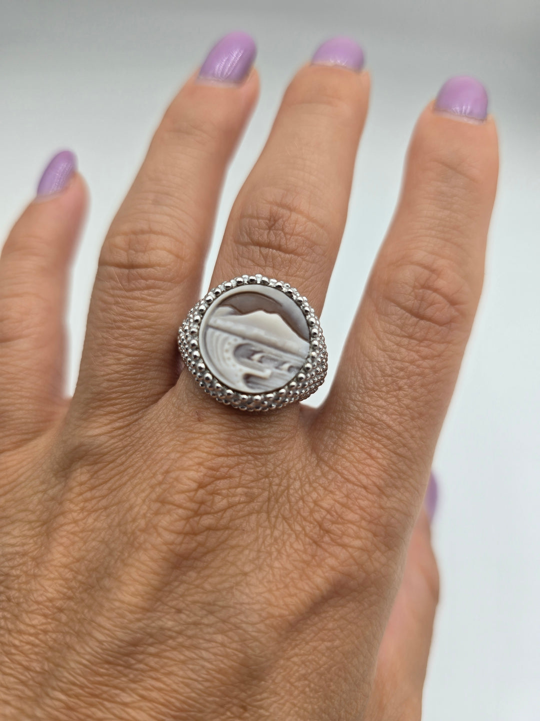 “Vesuvius” ring in sardonic cameo mounted in silver