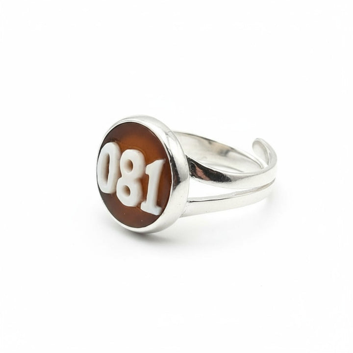 Rings with Neapolitan cameo charms mounted on silver