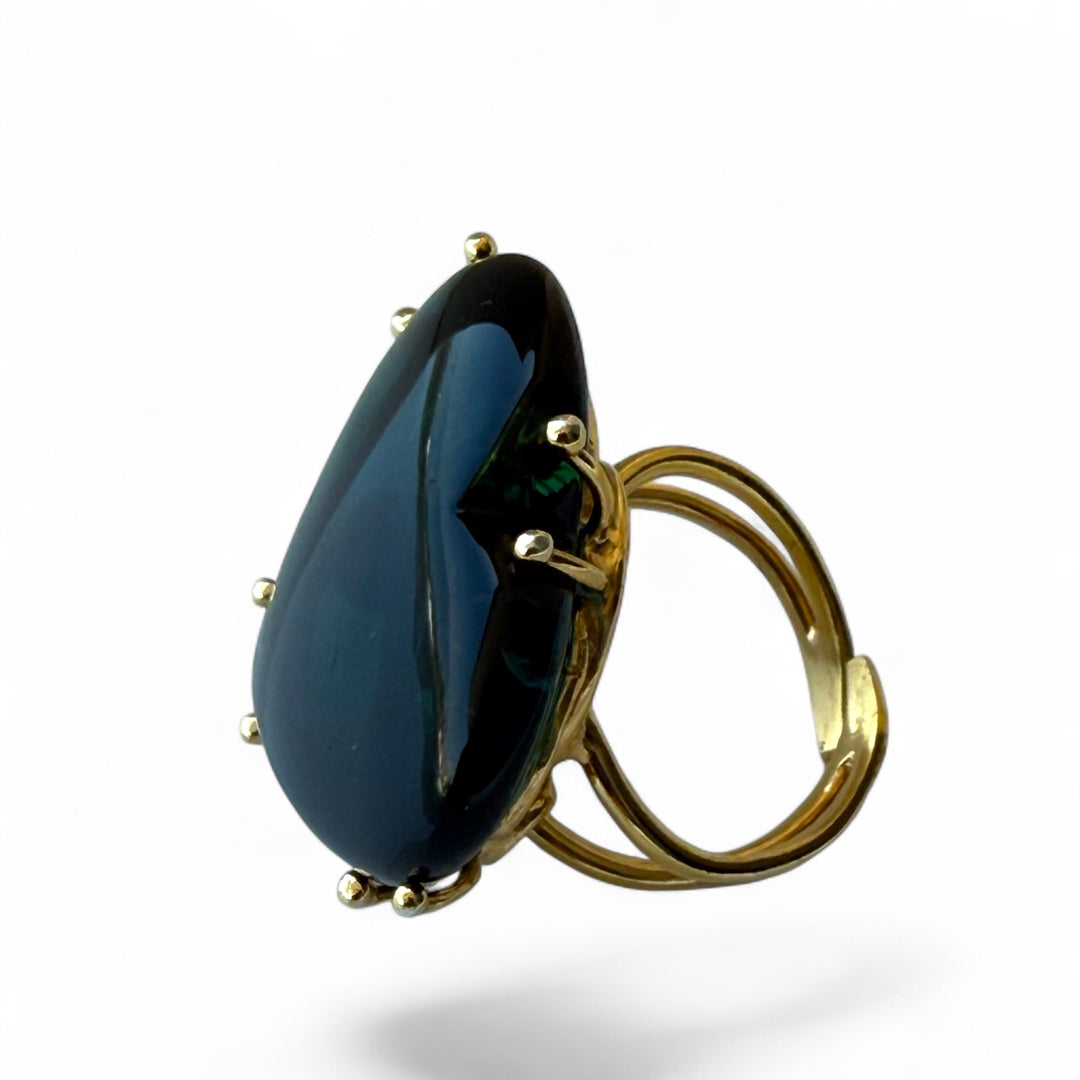 Faceted blue amber heart ring set in gold-plated silver