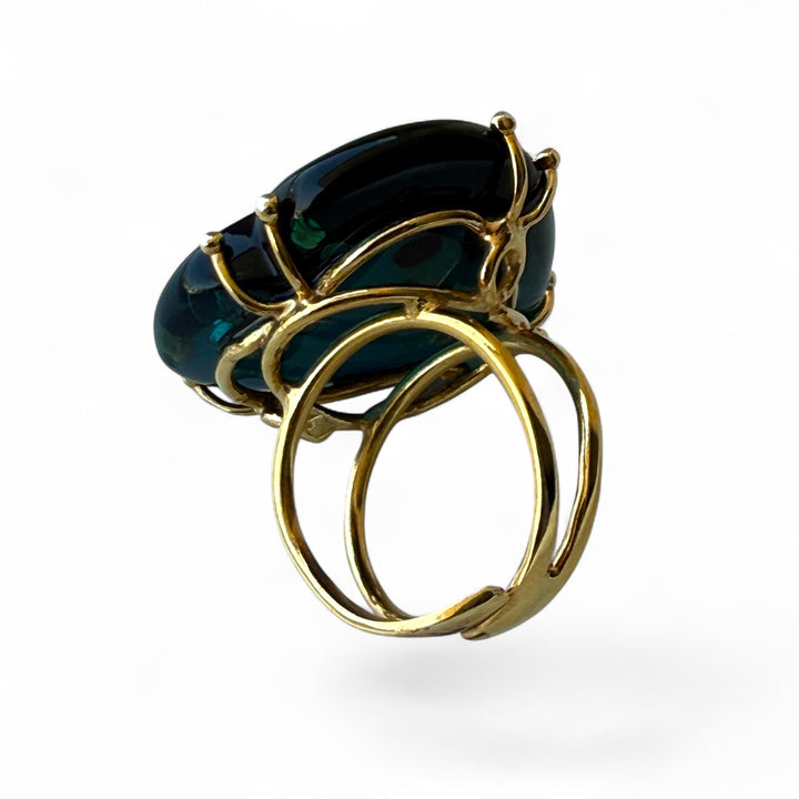 Faceted blue amber heart ring set in gold-plated silver