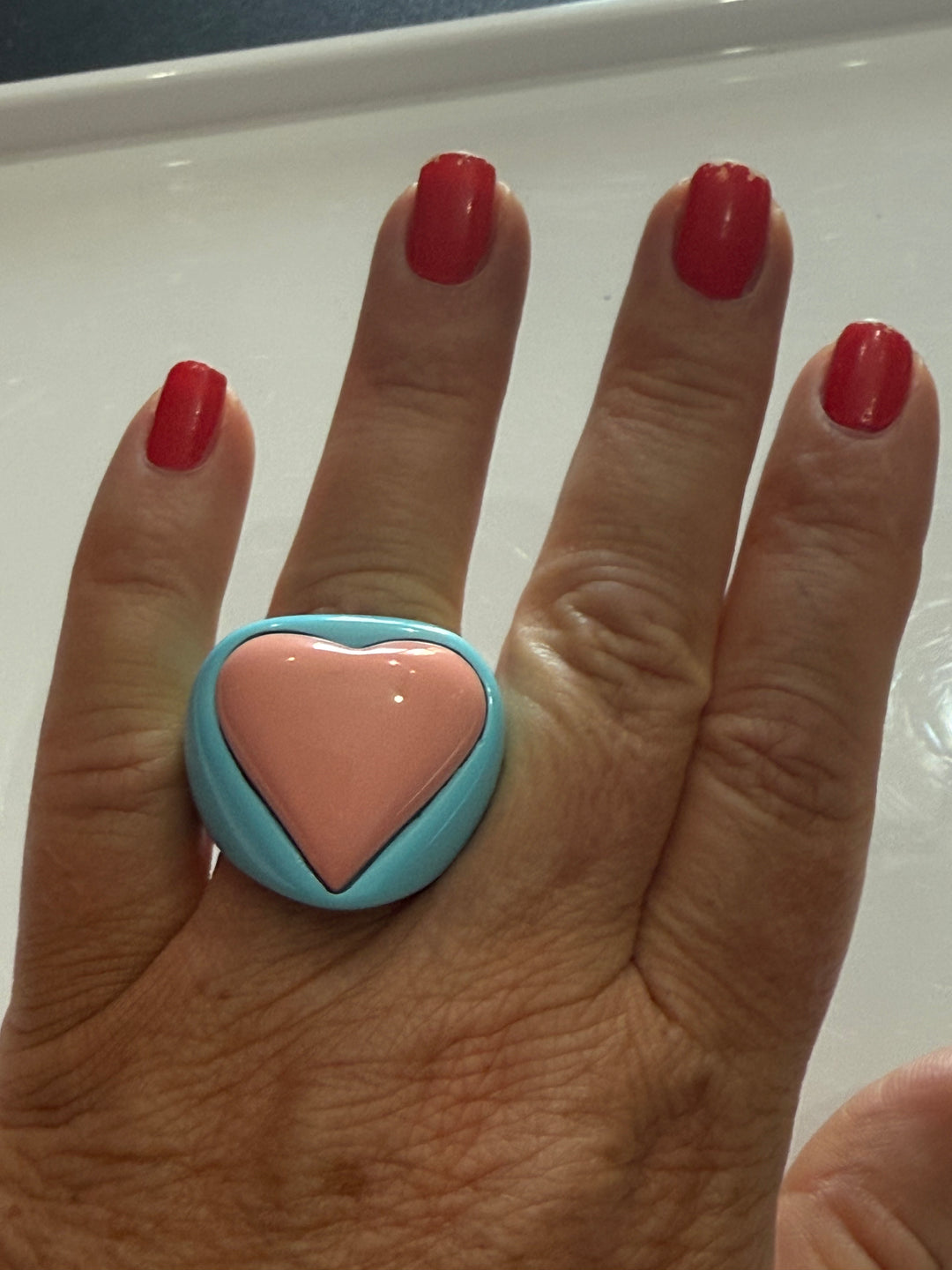 Pink heart ring in pink coral paste and turquoise paste with 4 flowers