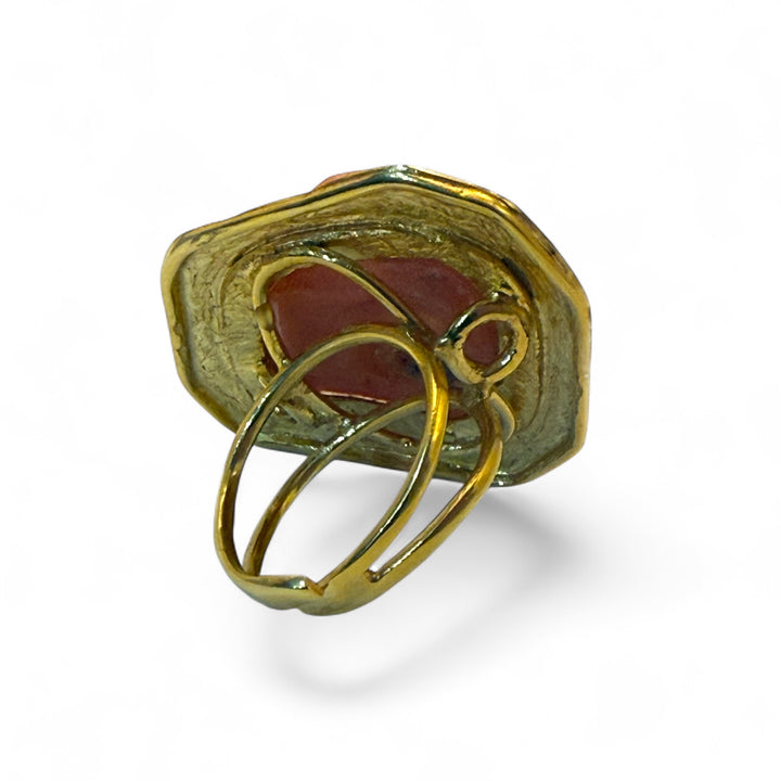 Anello “dea bendata” di corallo rosso Cerasuolo montato in argento placcato oro