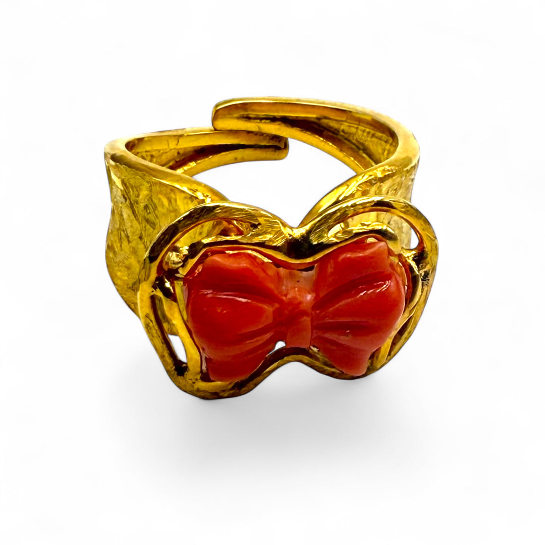 Anello fiocco di corallo Cerasuolo montato in argento