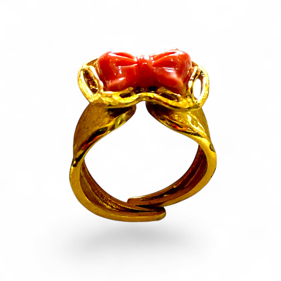 Anello fiocco di corallo Cerasuolo montato in argento