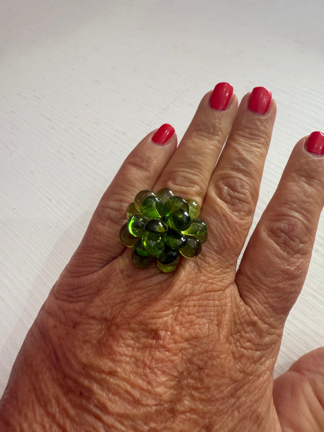 Anello fiore Ambra verde montato in argento dorato