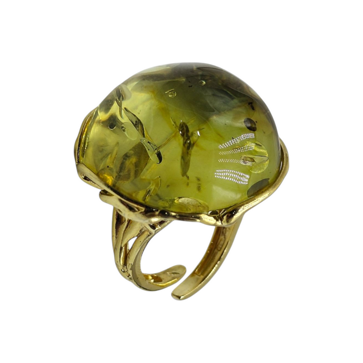 Green amber ring mounted on silver