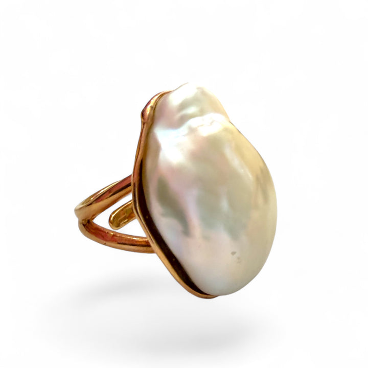 Anello perla barocca montata su argento ramato