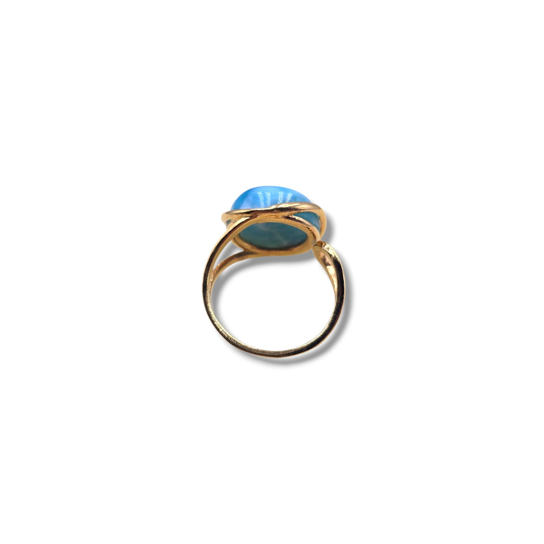 Anello rotondo Larimar montato in argento dorato