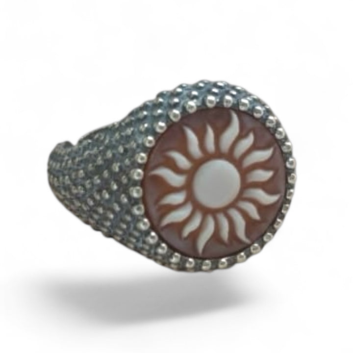 Sardonic cameo “sun” ring mounted in silver