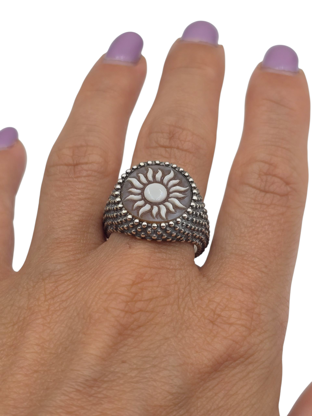 Sardonic cameo “sun” ring mounted in silver
