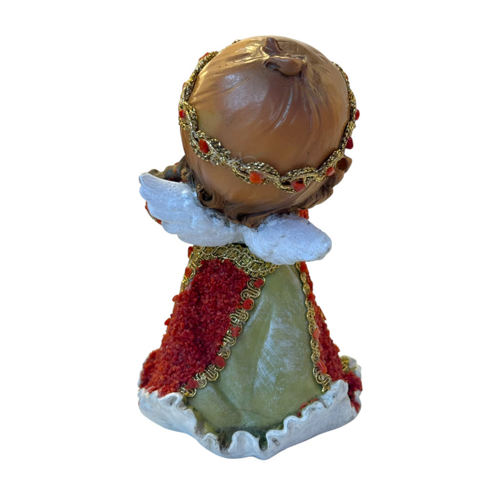 Cherub angel with coral-studded violin