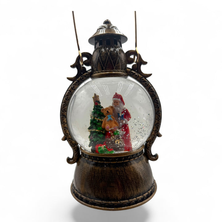 Babbo Natale in lanterna con musica, colori e coriandoli