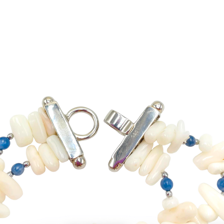 White coral and kyanite branch bracelet mounted on silver
