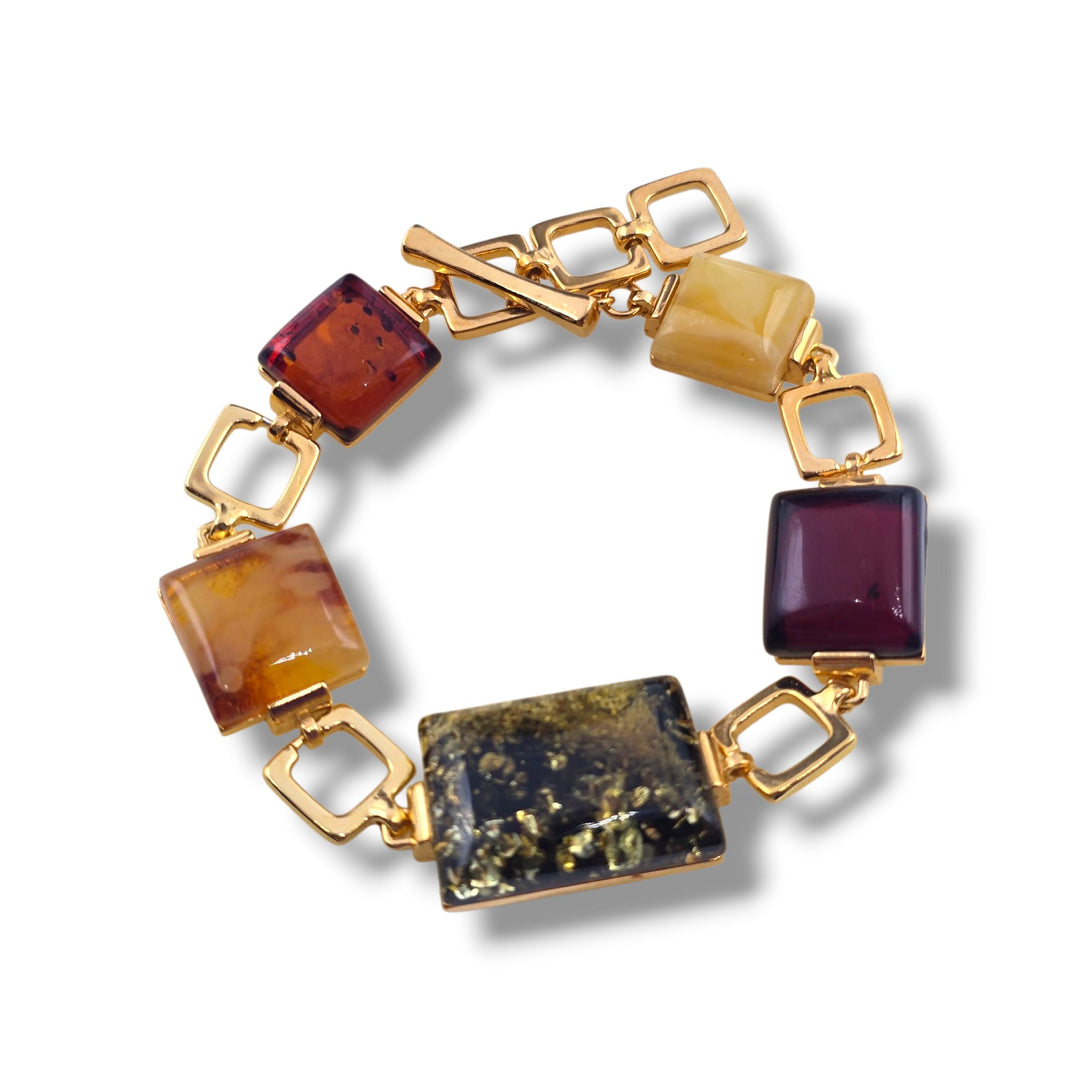 Bracciale quadrato di ambra multicolore montato in argento dorato