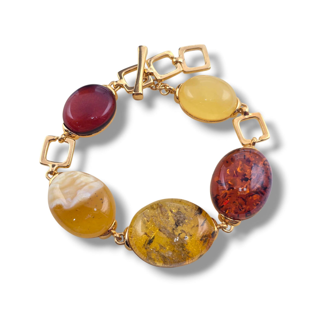 Bracciale quadrato di ambra multicolore montato in argento dorato